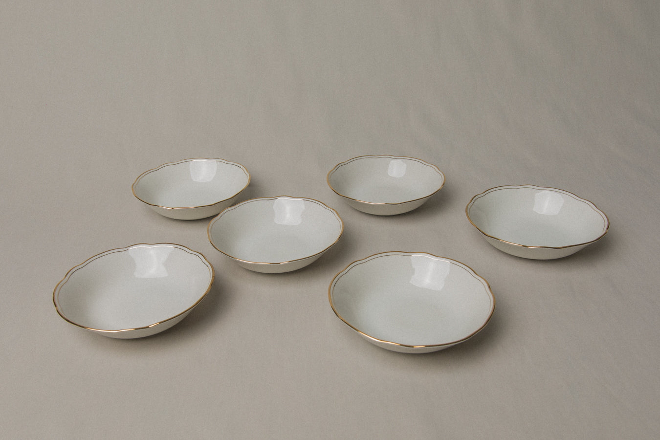 Set of six vintage porcelain small BOWLS with gold stripe