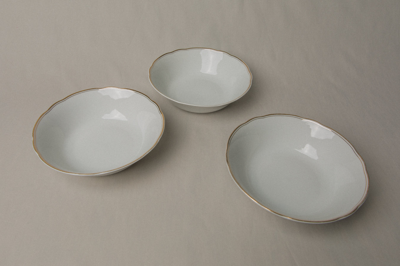 Set of three vintage porcelain SERVING BOWLS with gold stripe