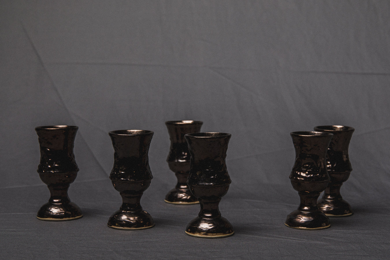 Set of six religious-themed faience CUPS