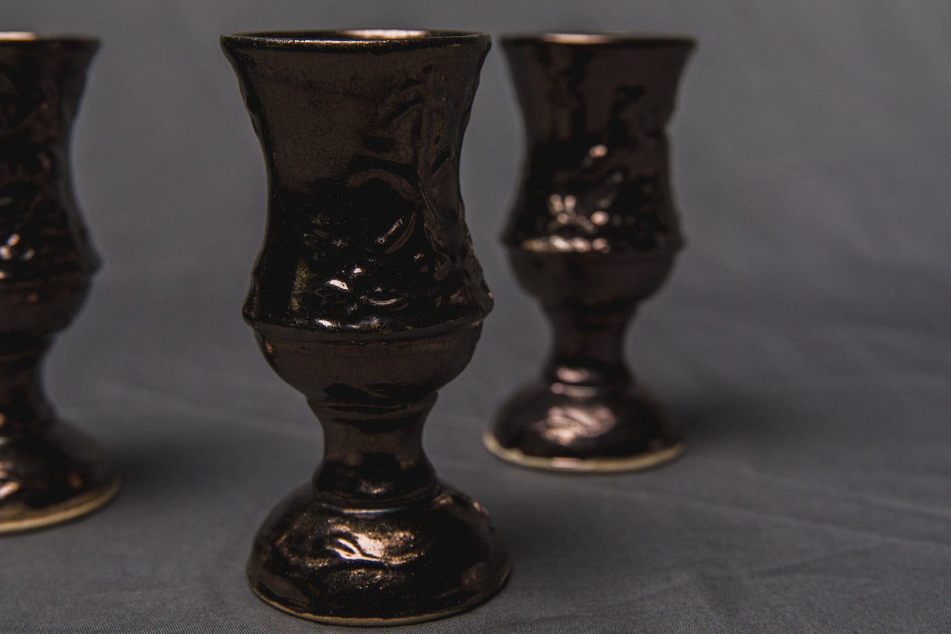 Set of five religious-themed faience CUPS