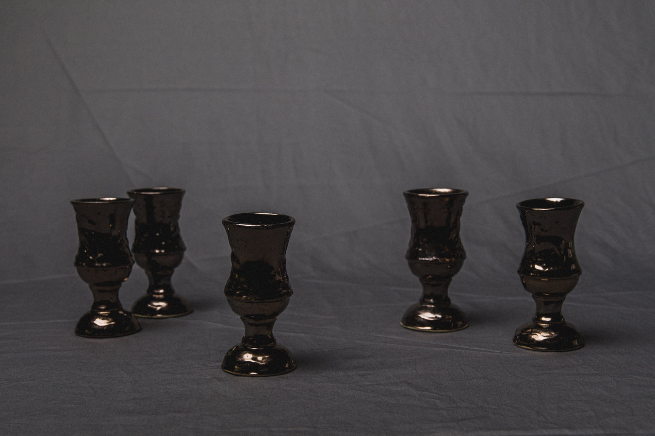 Set of five religious-themed faience CUPS