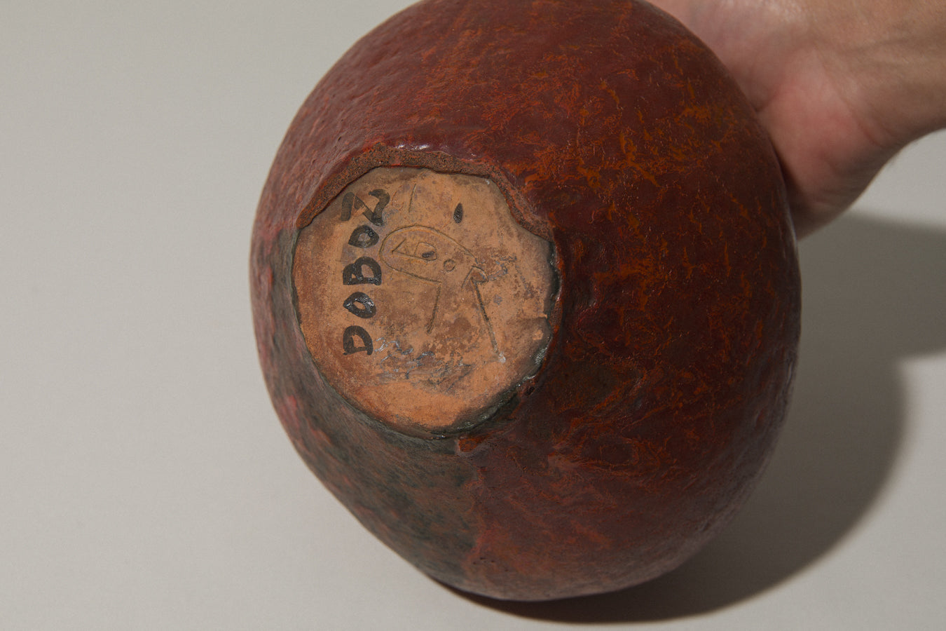 Low wide-mouthed VASE in dark orange by István Gádor