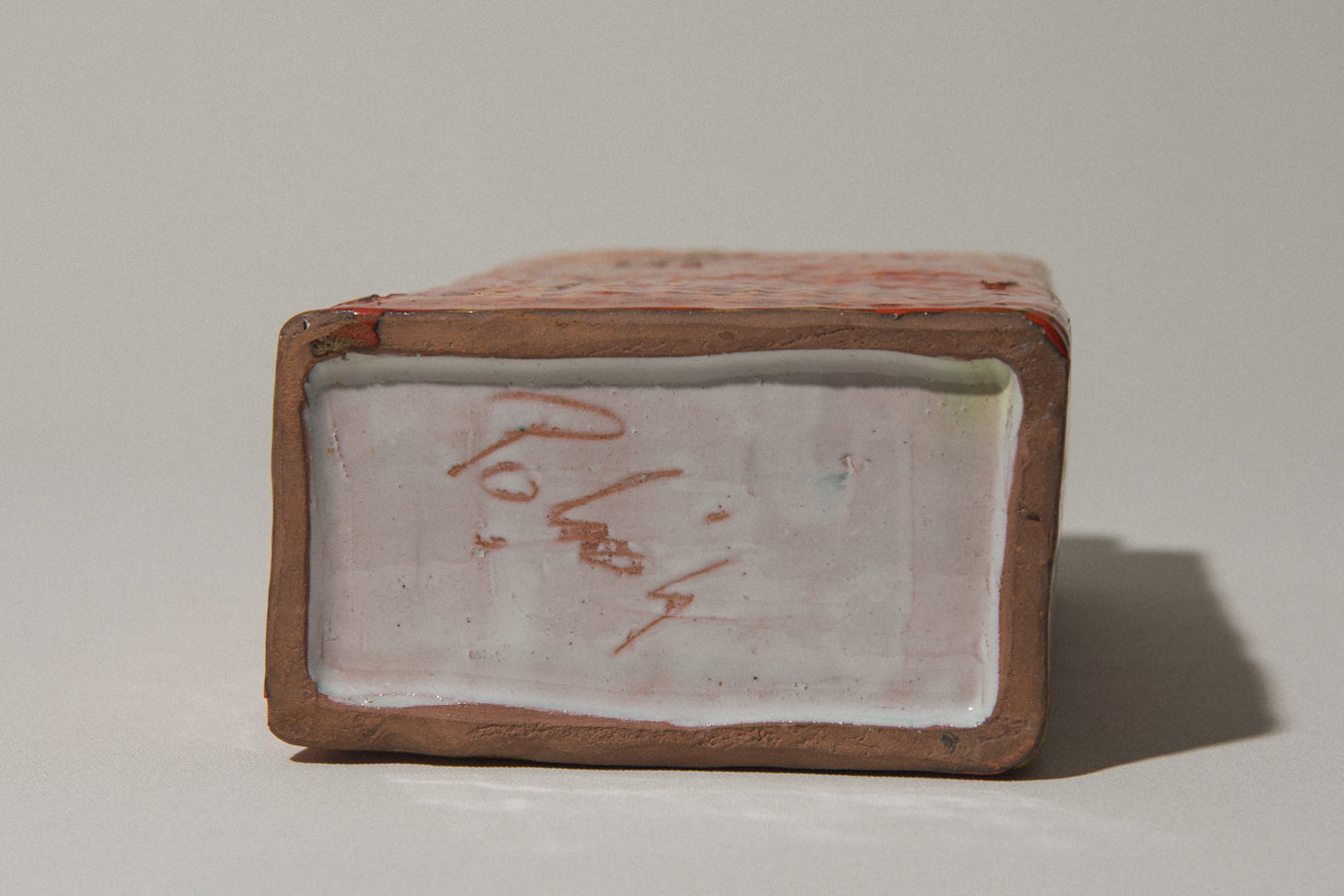 Orange rectangular ceramic VASE by János Polyák