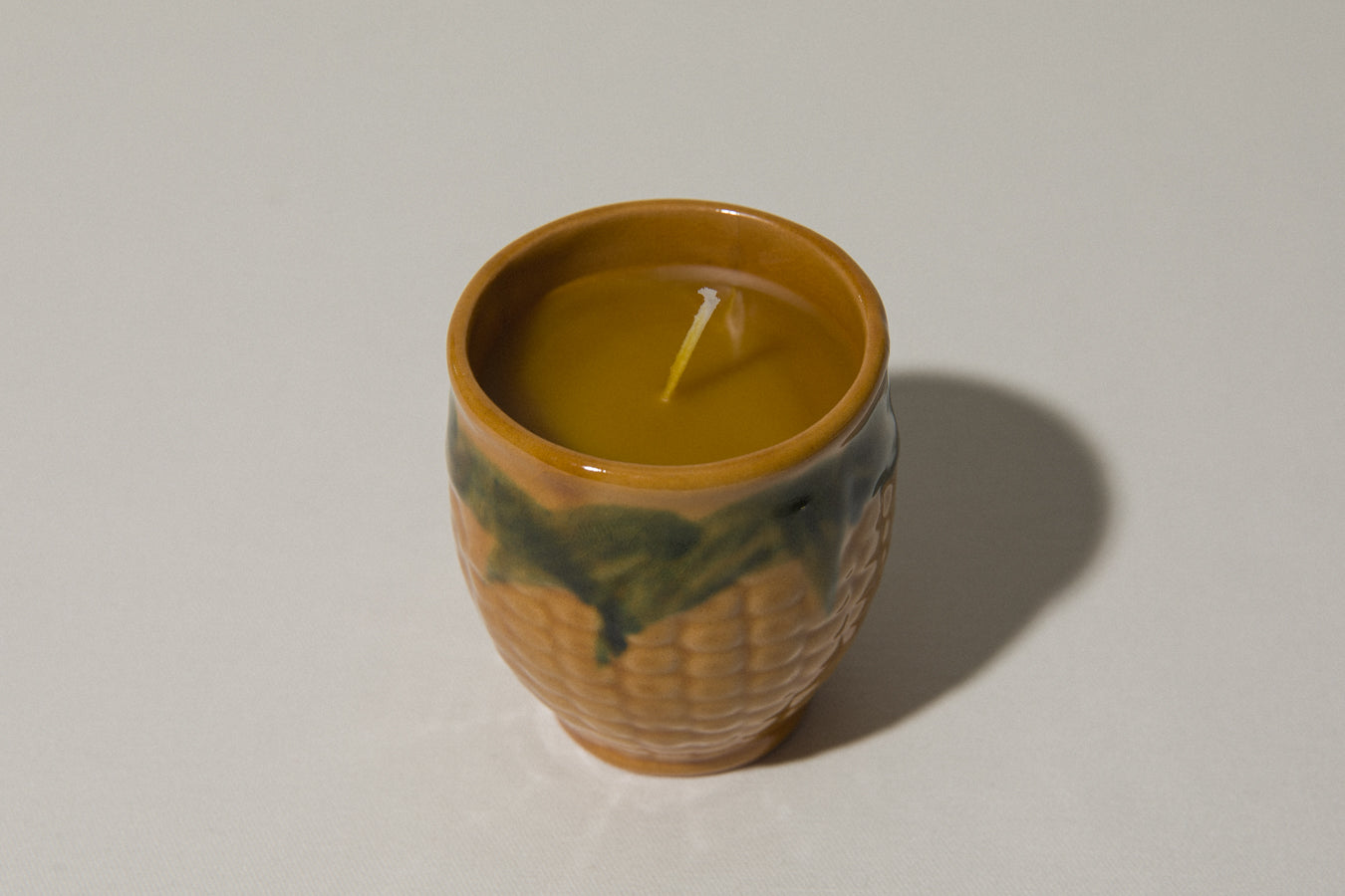 Beeswax CANDLE in corn-motif faience holder