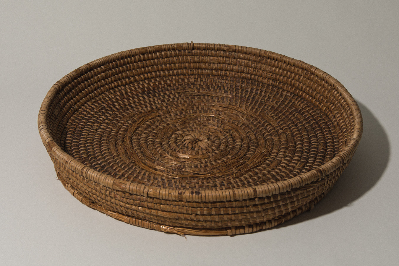 Large round flat BASKET with raised rim