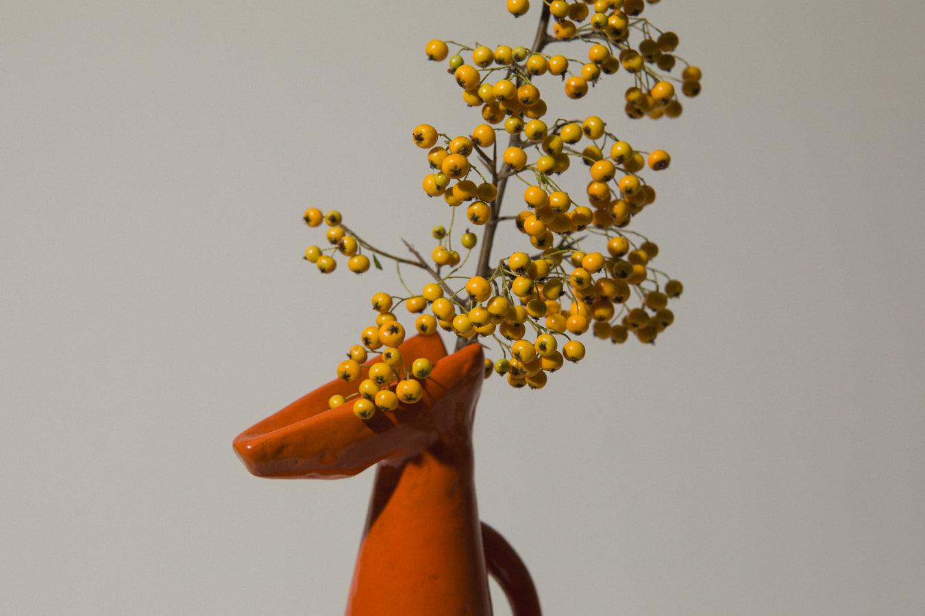 Orange giraffe-shaped VASE by István Gádor