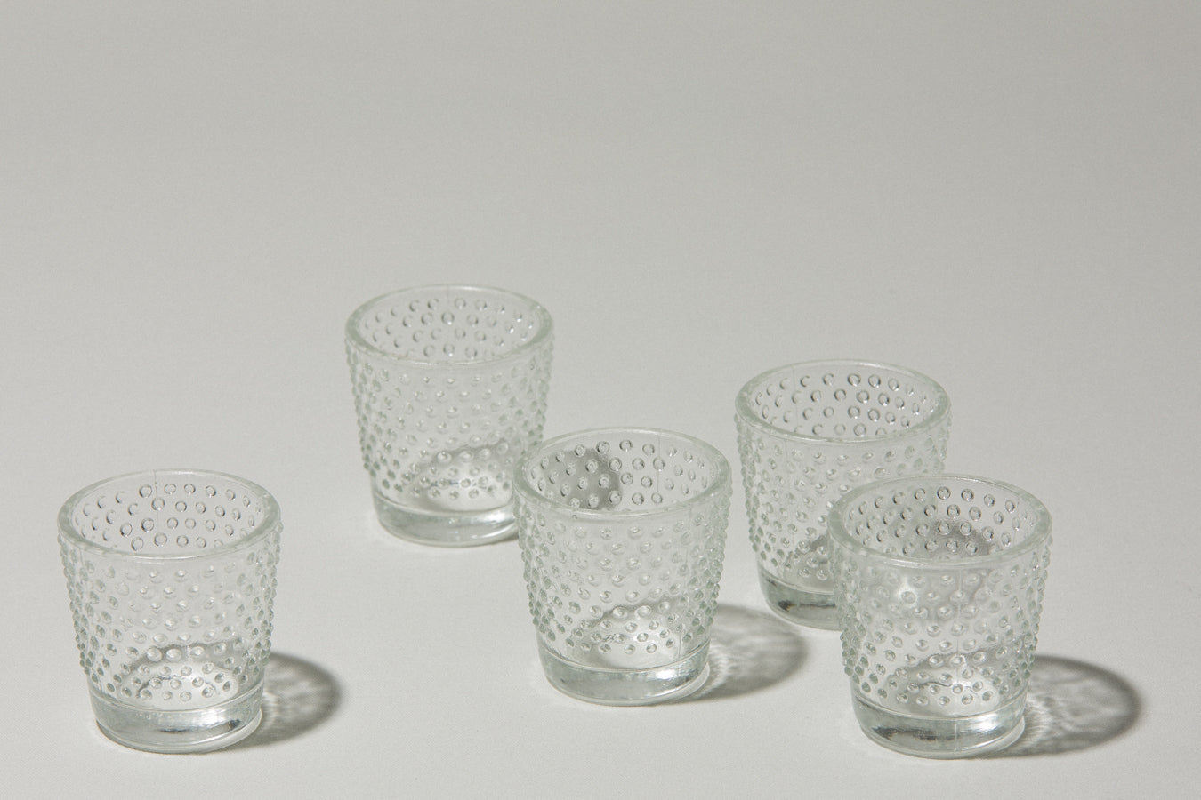 Set of five glass TUMBLERS