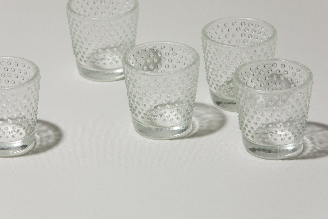 Set of five glass TUMBLERS