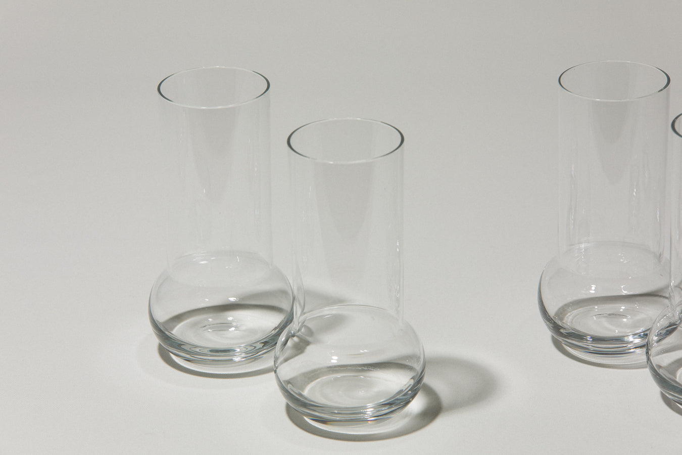 Set of five glass TUMBLERS