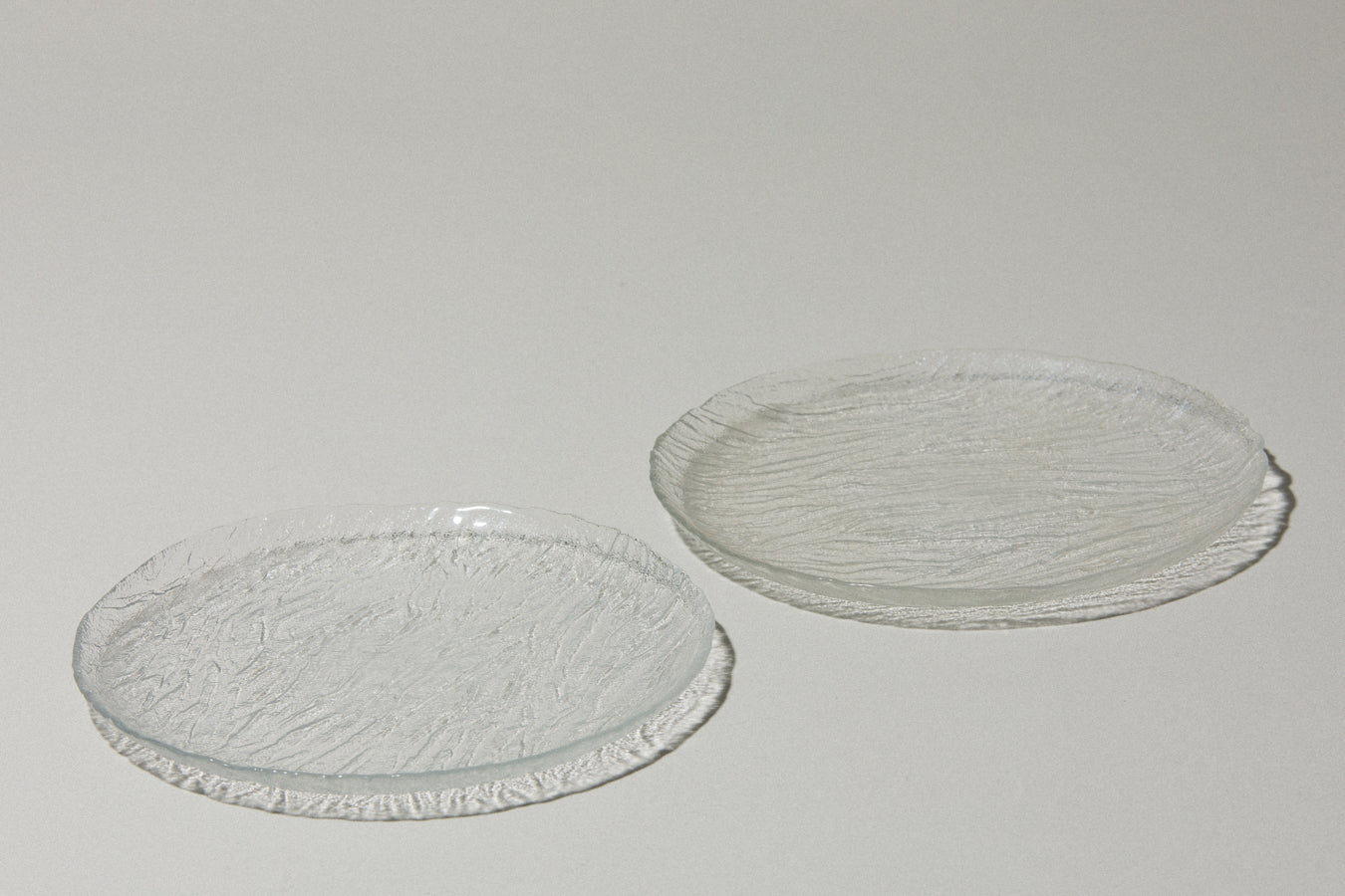 Set of two textured glass SERVING PLATES