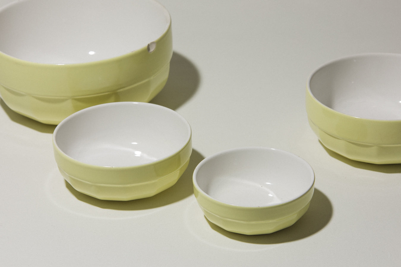 Set of four yellow Gránit BOWLS
