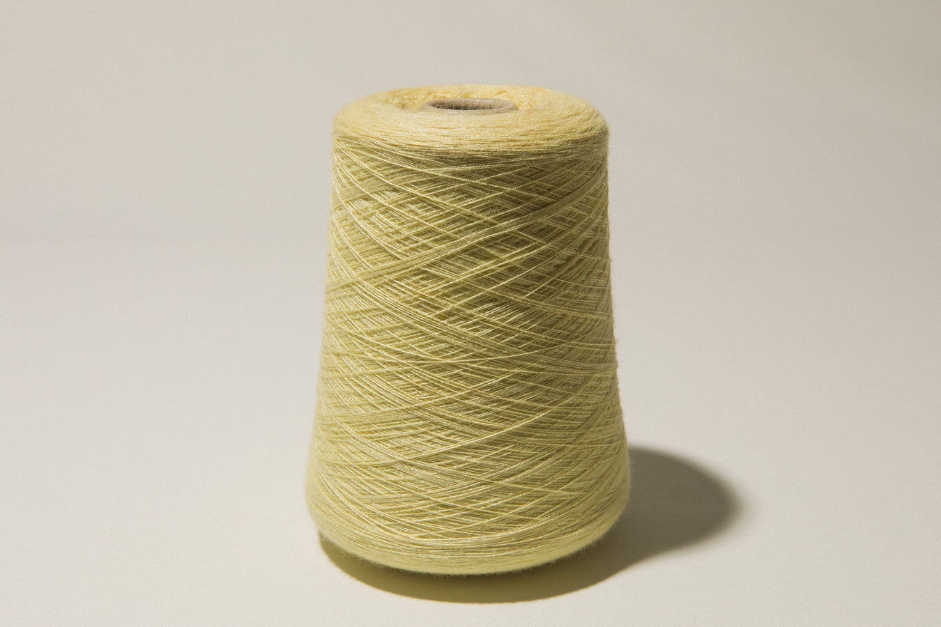 Light yellow vintage YARN on cone