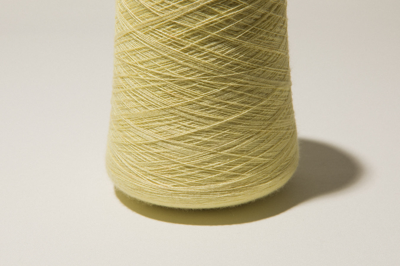 Light yellow vintage YARN on cone
