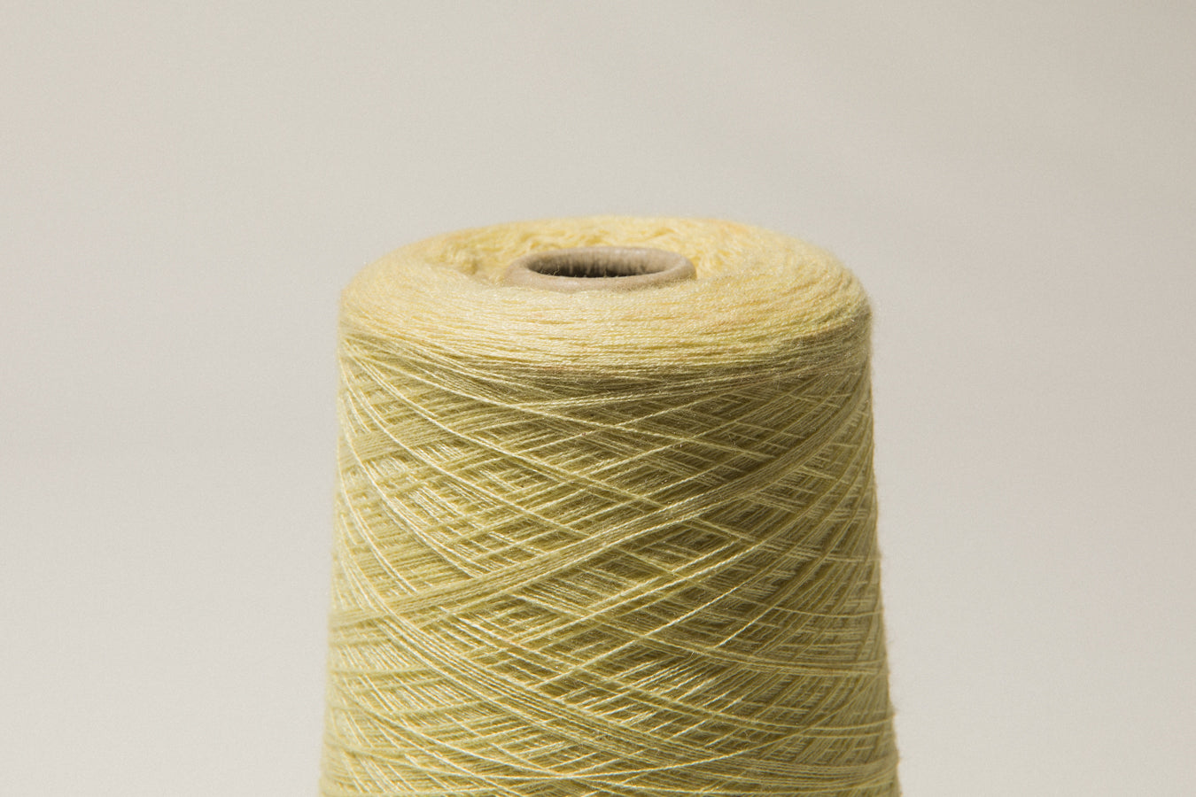 Light yellow vintage YARN on cone