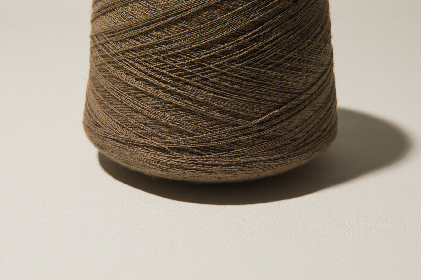 Dull brown vintage YARN on cone