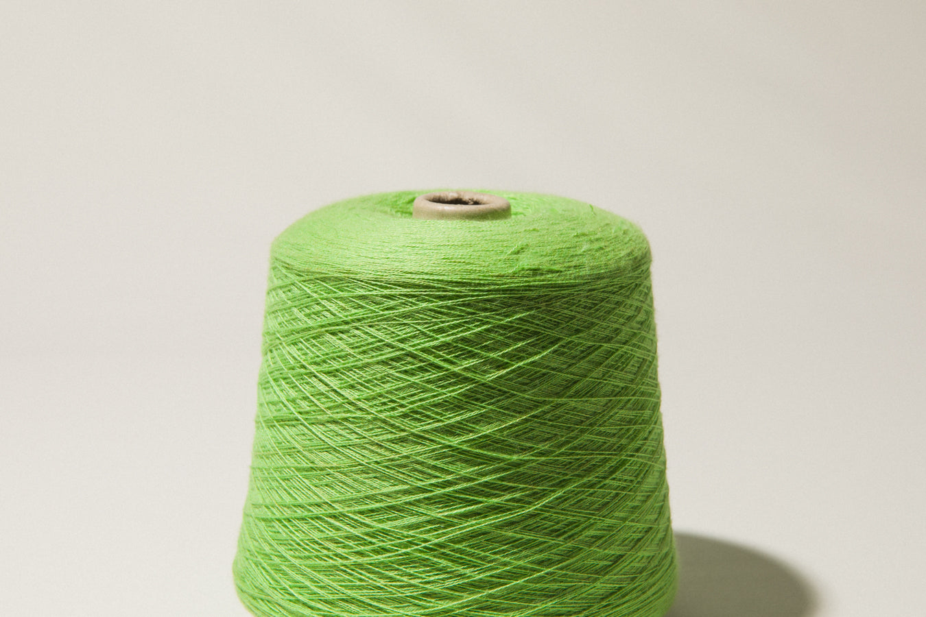 Lime green vintage YARN on cone
