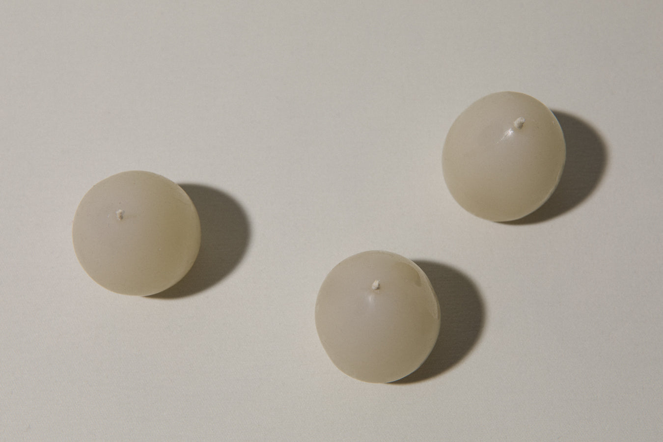 Egg-shaped CANDLE beige set of three