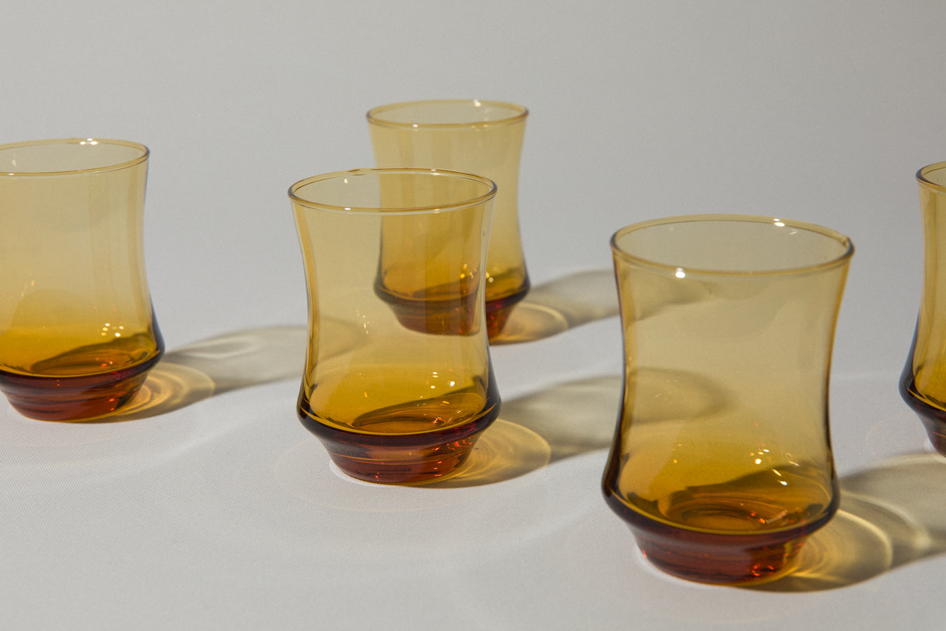 Set of five amber drinking GLASSES