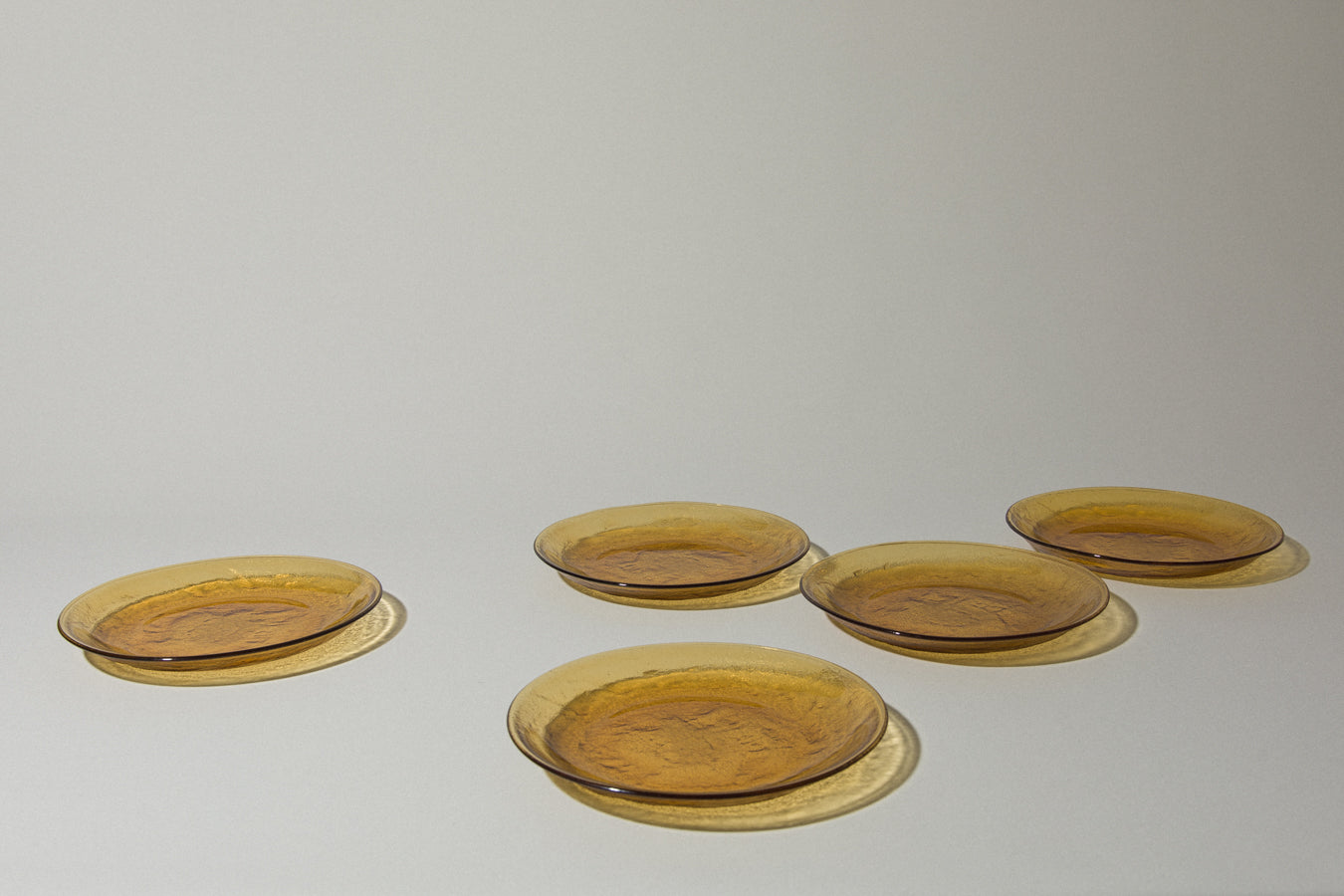 Set of five amber glass DESSERT PLATES