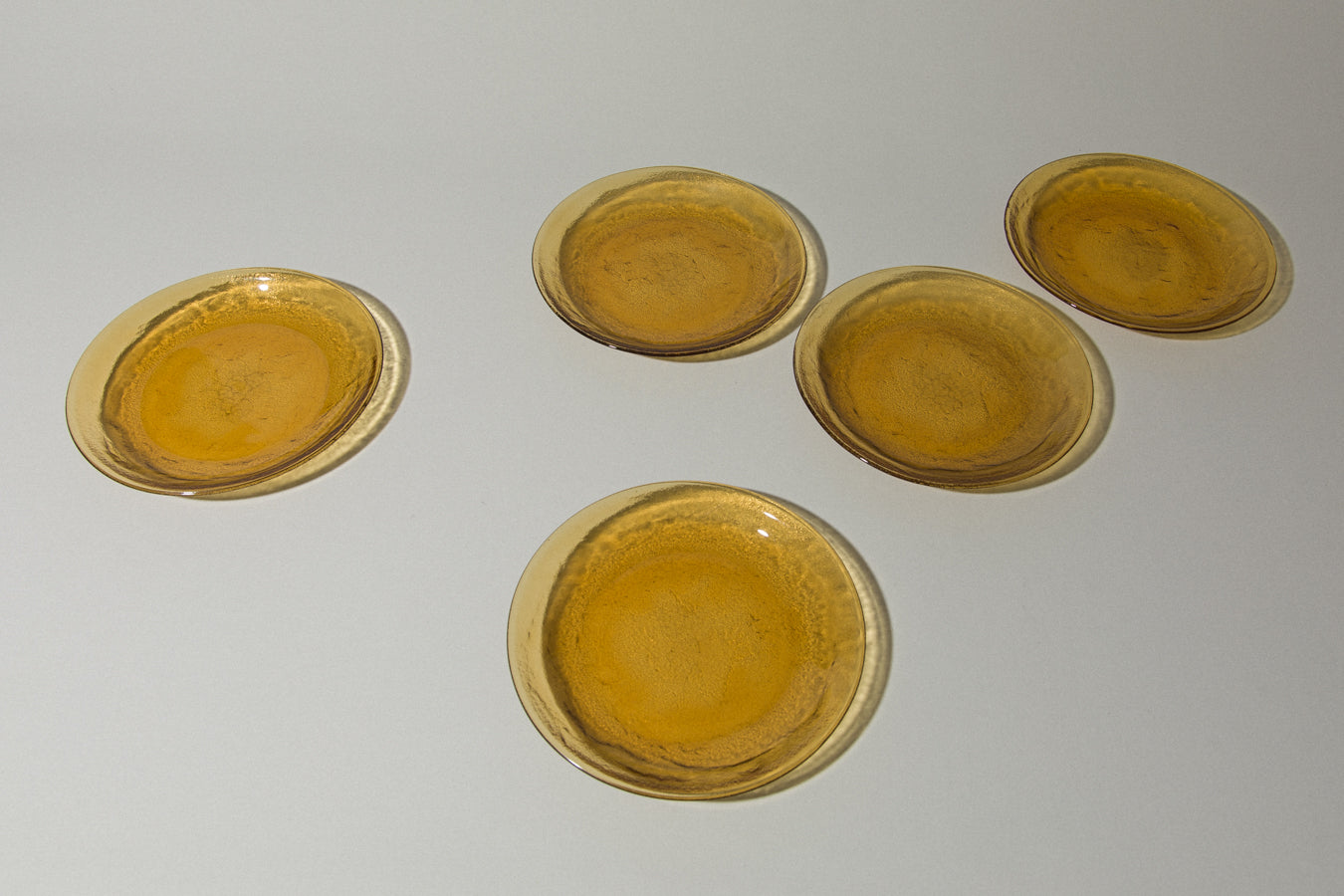 Set of five amber glass DESSERT PLATES