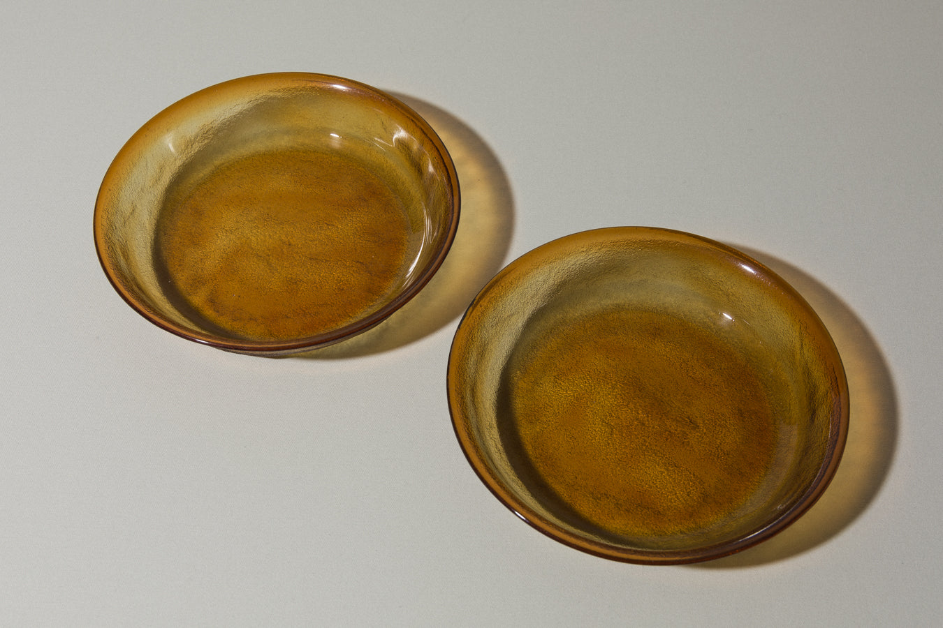 Set of two amber glass SOUP PLATES