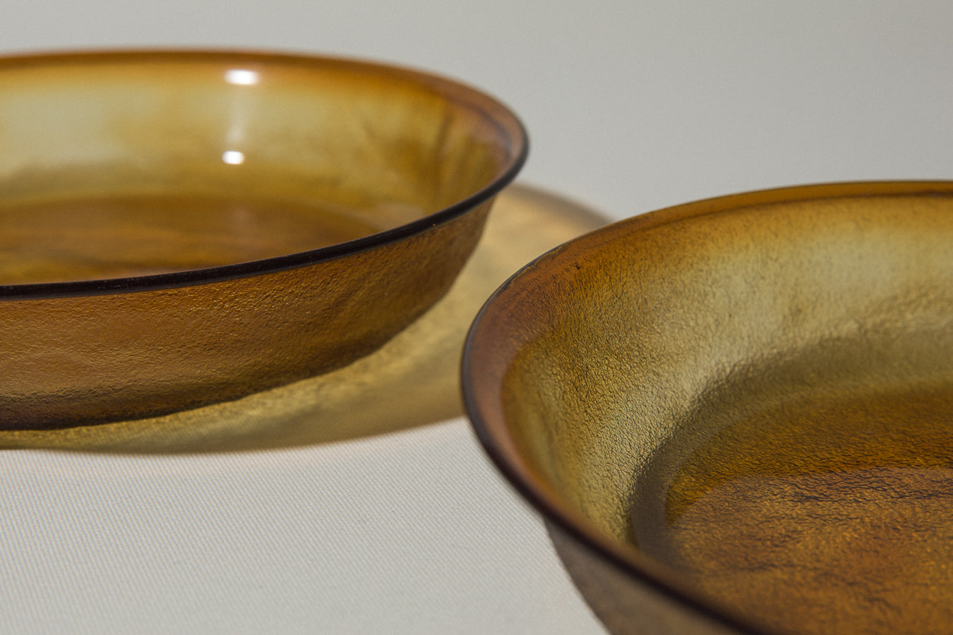 Set of two amber glass SOUP PLATES