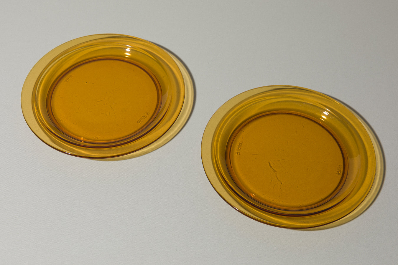 Set of two amber glass DESSERT PLATES