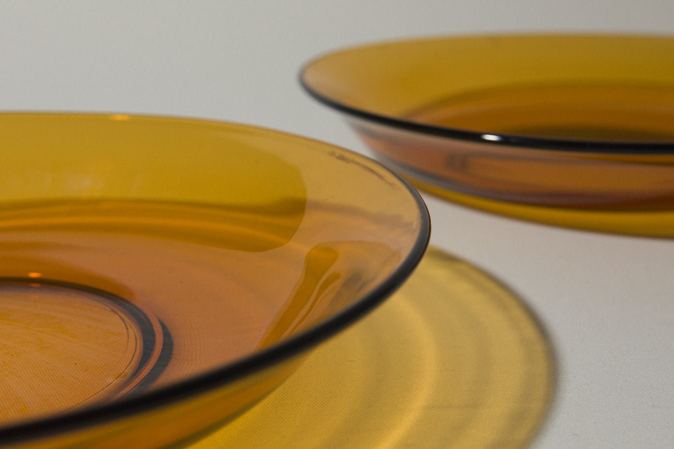 Set of two amber glass SERVING BOWLS