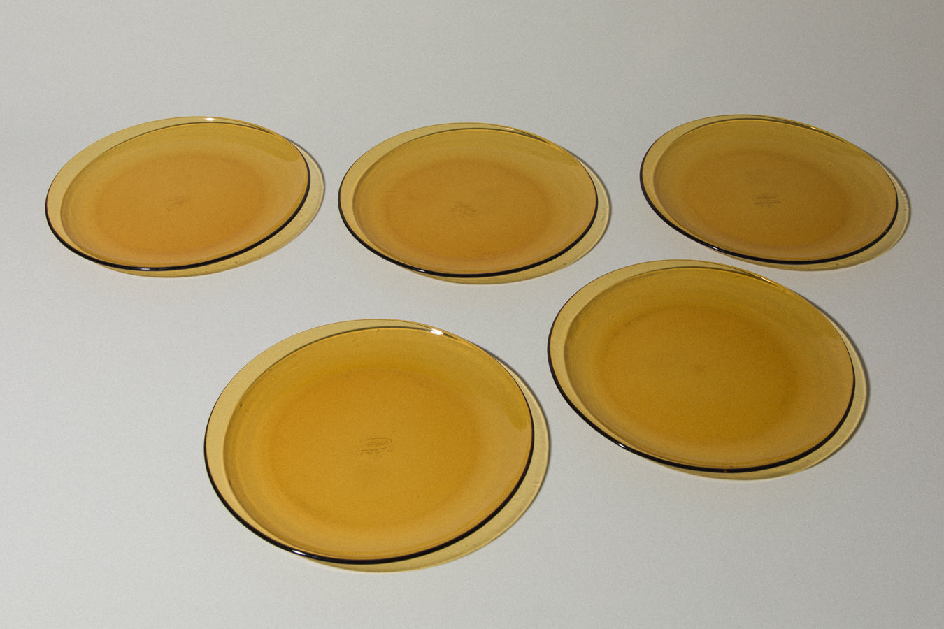 Set of five amber glass DINNER PLATES