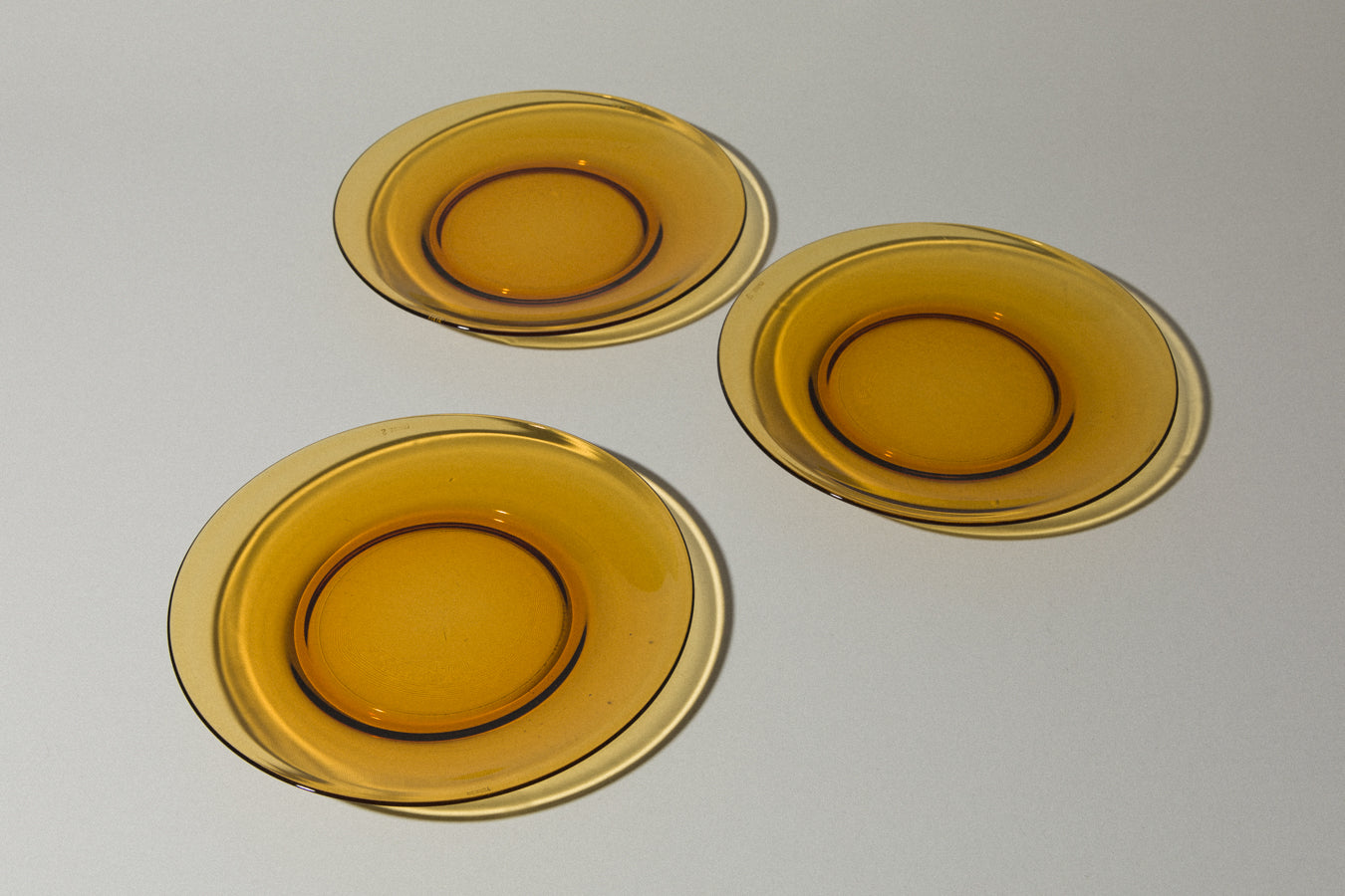 Set of three amber glass DINNER PLATES