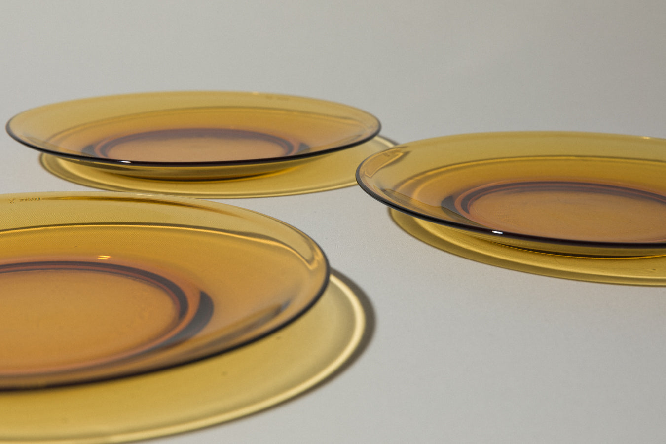 Set of three amber glass DINNER PLATES
