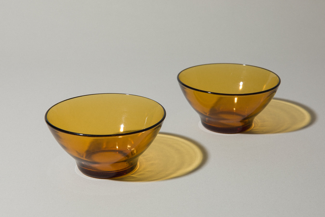 Set of two amber glass BOWLS small