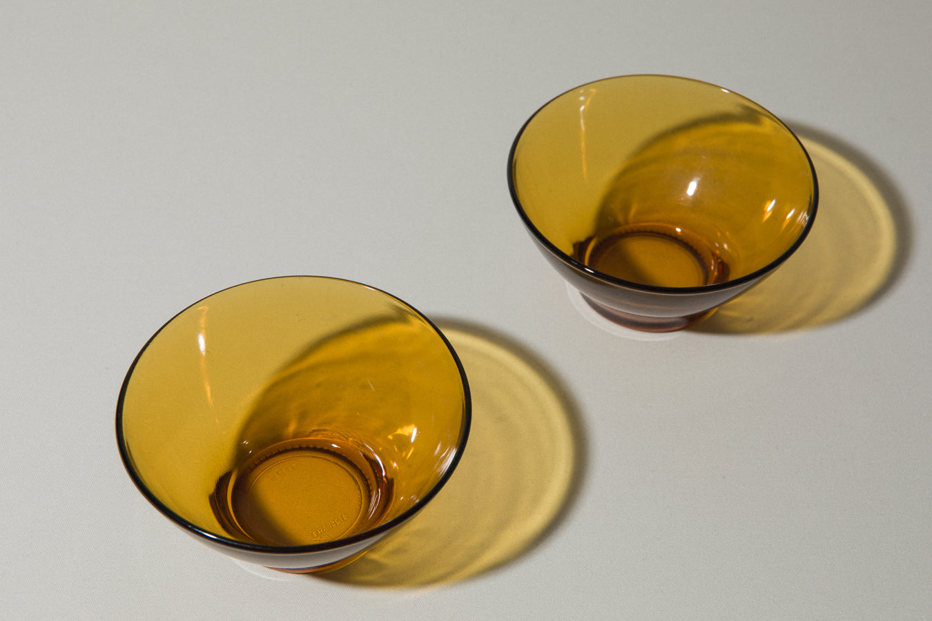 Set of two amber glass BOWLS small