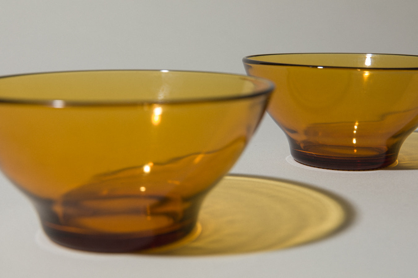 Set of two amber glass BOWLS small
