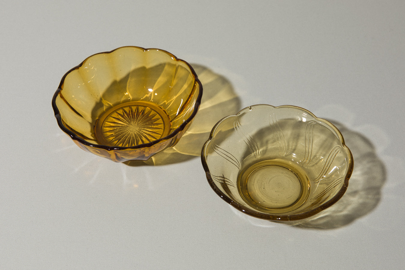 Set of two amber glass BOWLS small