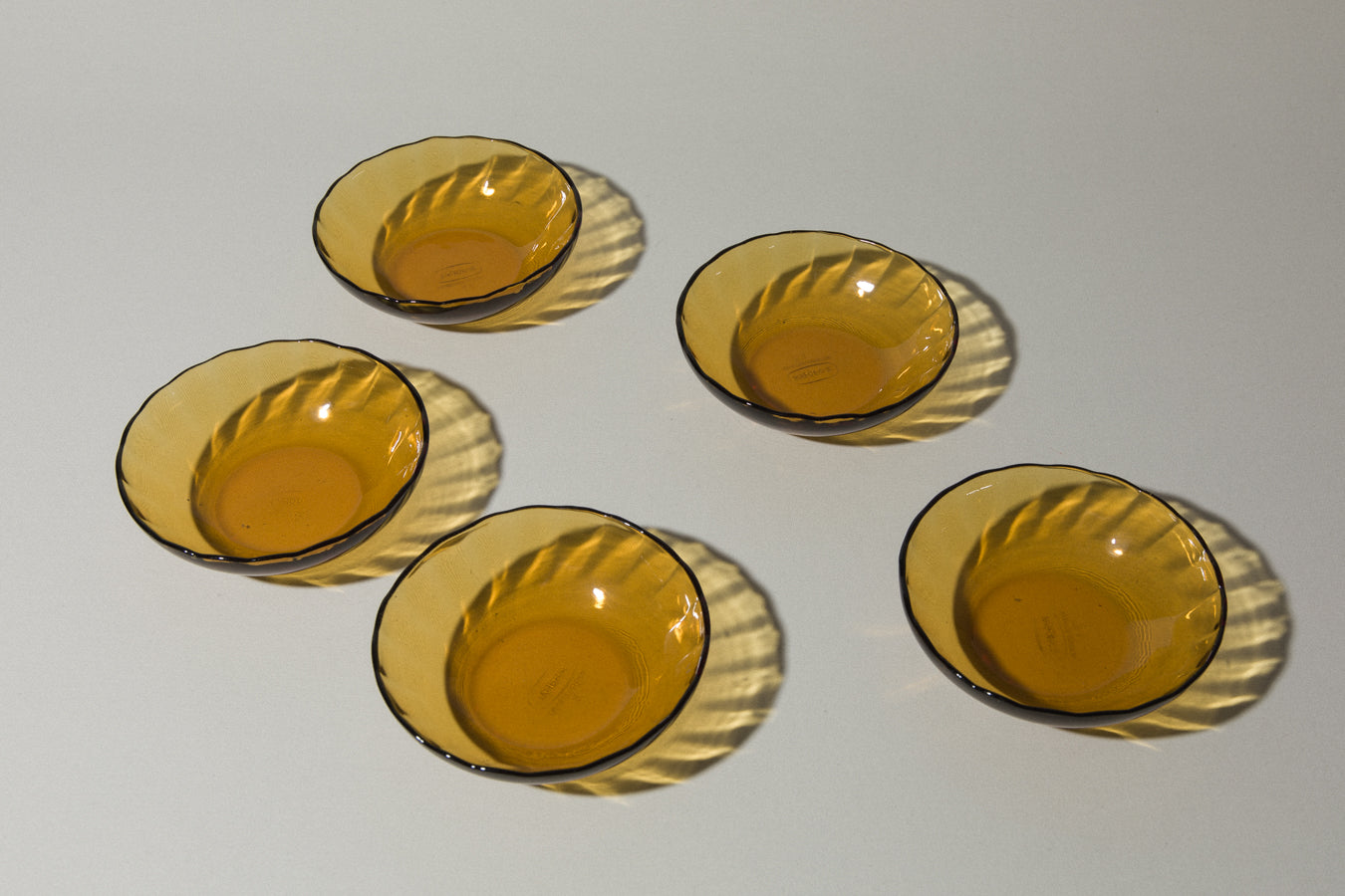 Set of five amber glass BOWLS small
