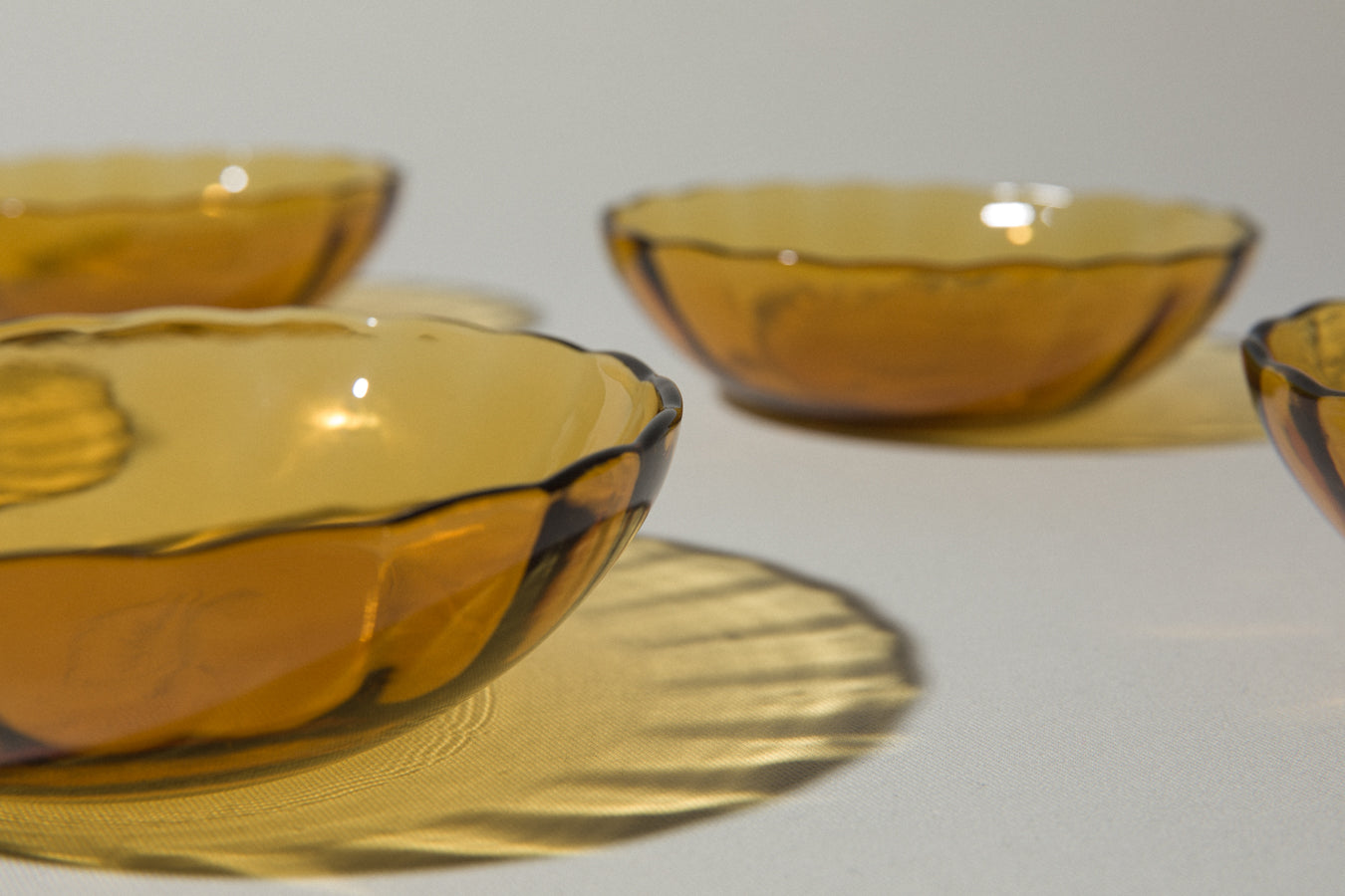 Set of five amber glass BOWLS small