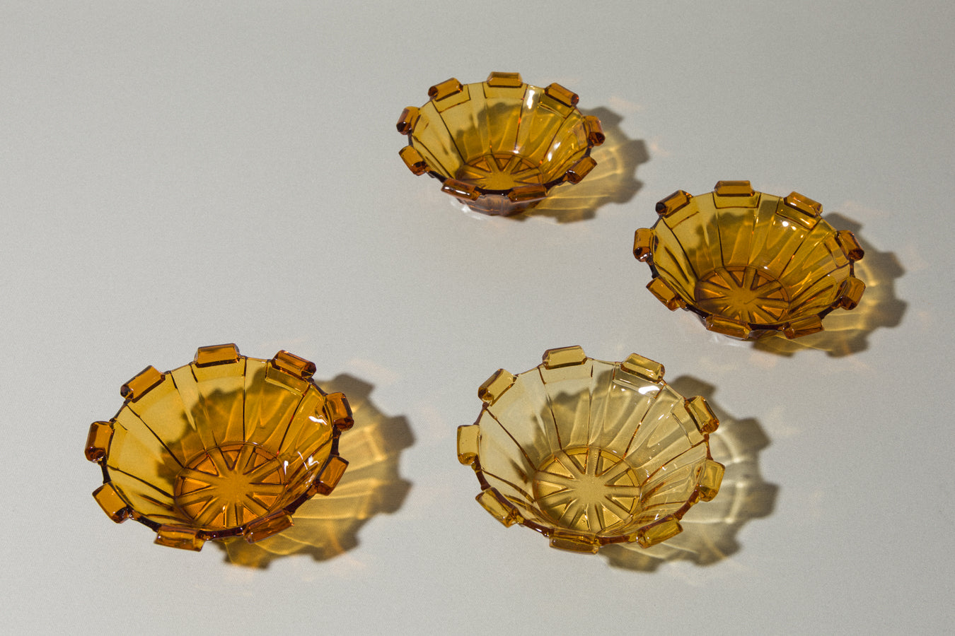 Set of four amber glass BOWLS small