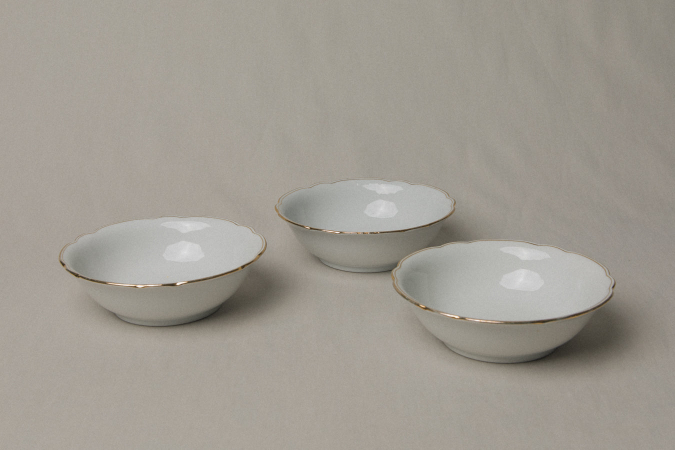 Set of three vintage porcelain small BOWLS with gold stripe
