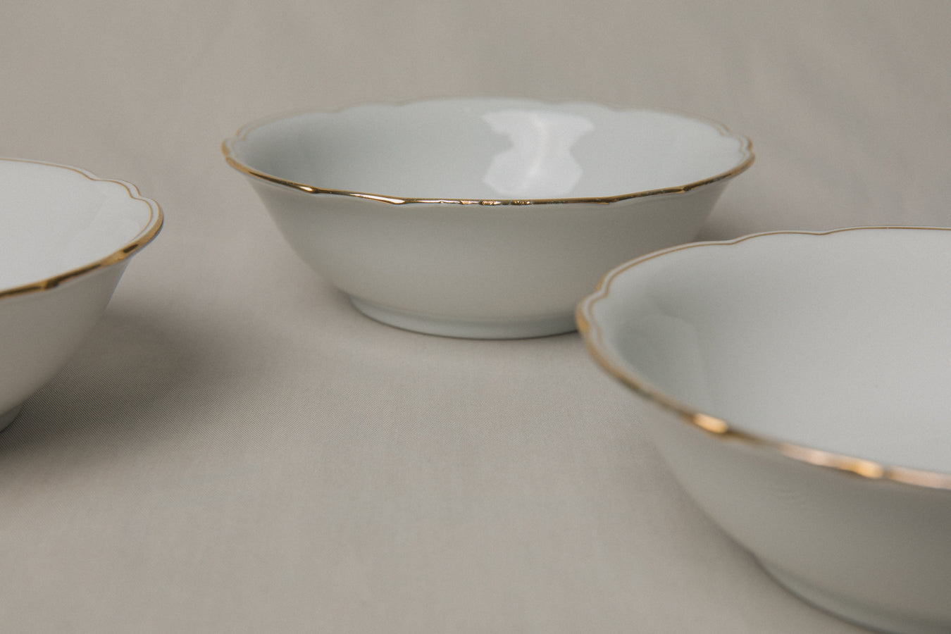 Set of three vintage porcelain small BOWLS with gold stripe