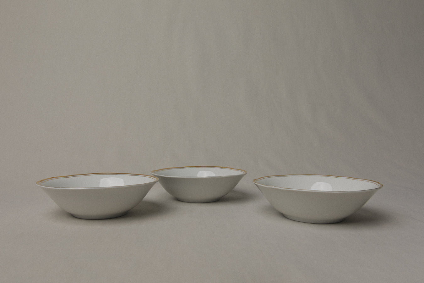 Set of three vintage porcelain small BOWLS with gold stripe