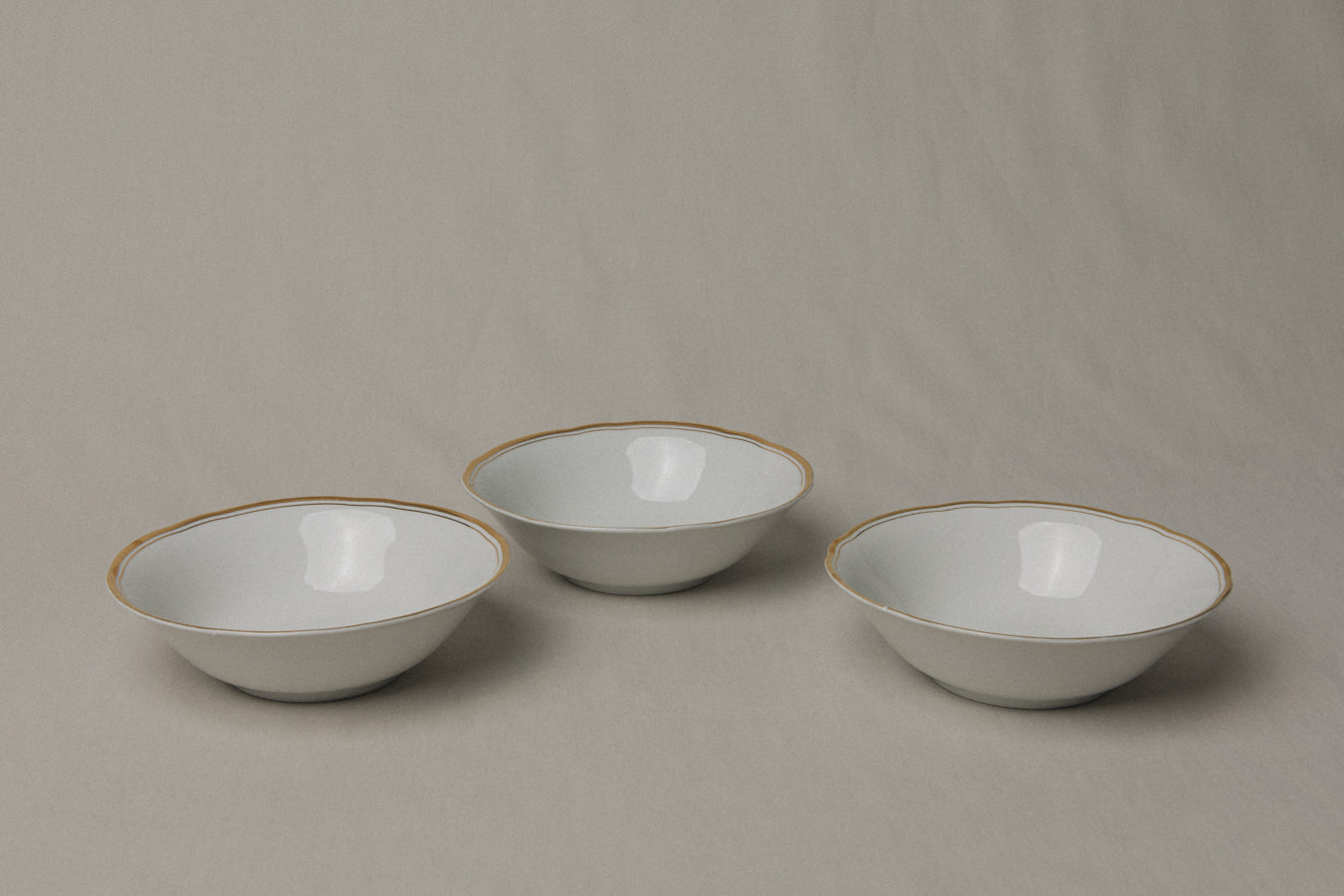 Set of three vintage porcelain small BOWLS with gold stripe