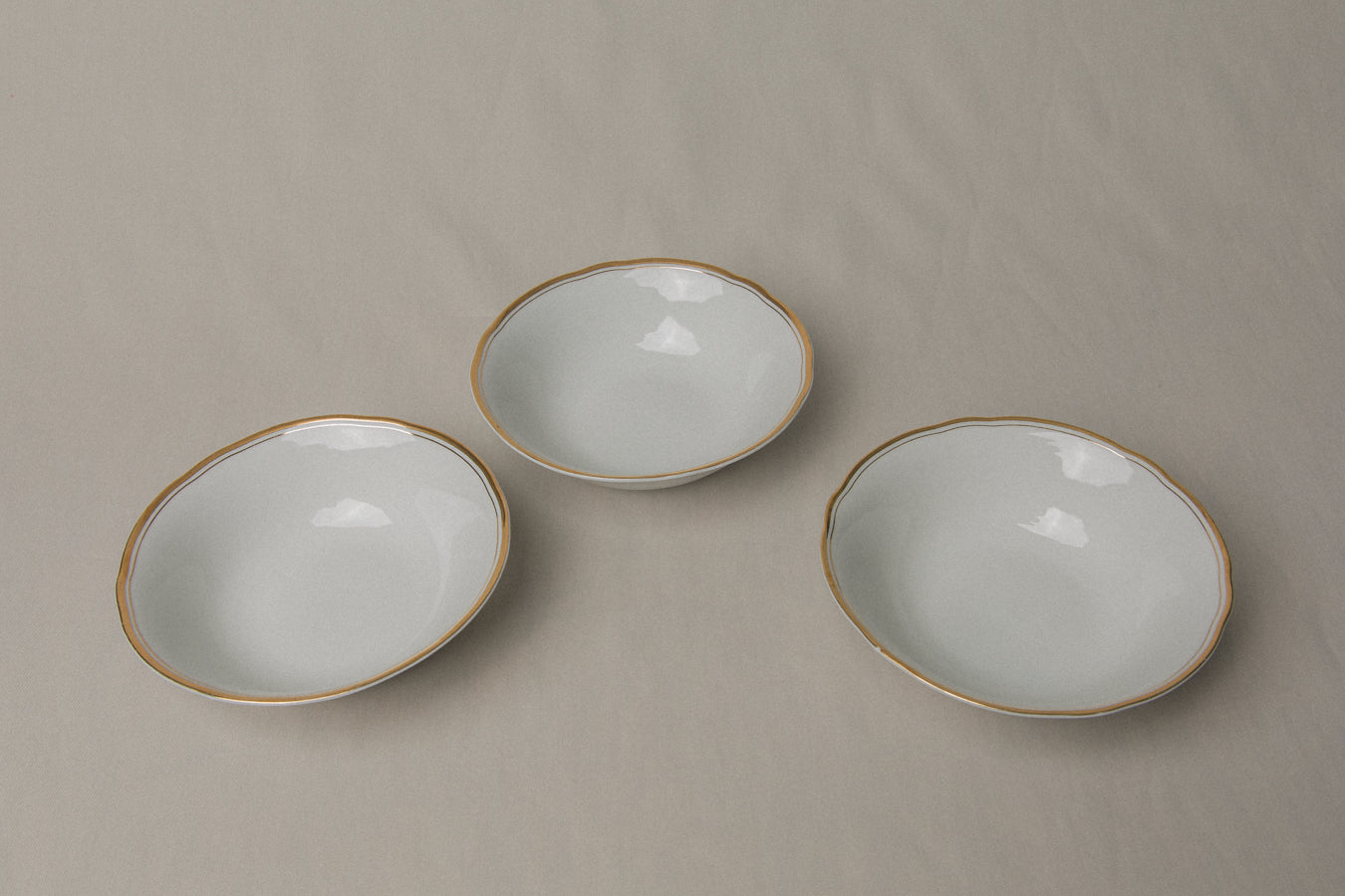 Set of three vintage porcelain small BOWLS with gold stripe