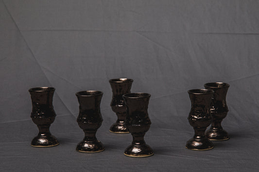 Set of six religious-themed faience CUPS