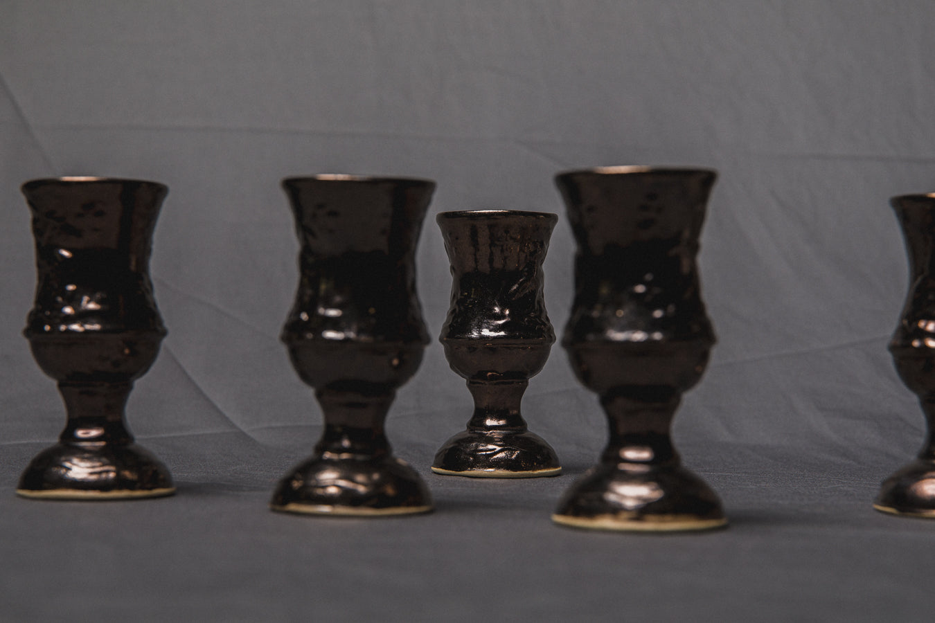 Set of six religious-themed faience CUPS