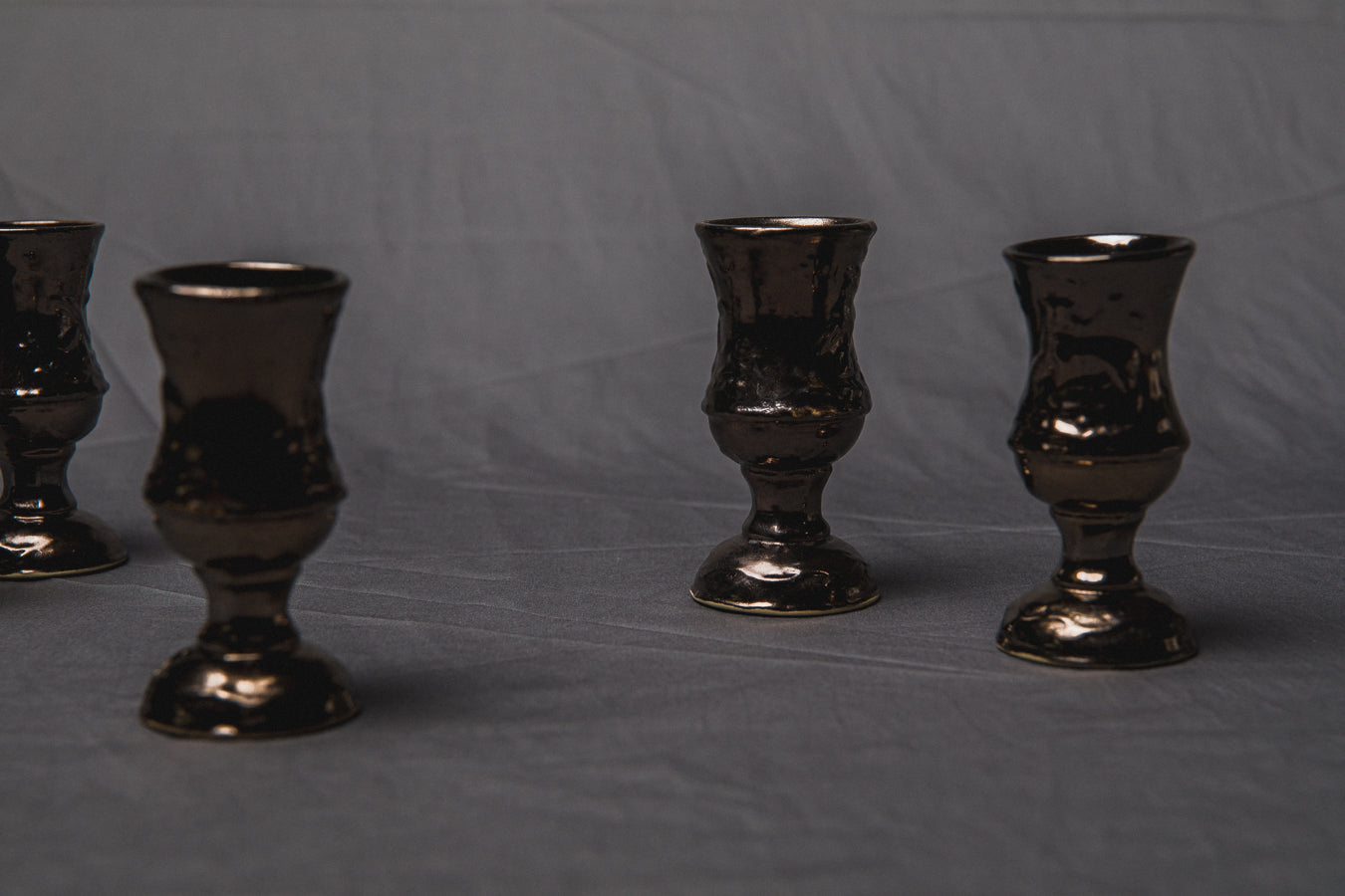 Set of five religious-themed faience CUPS