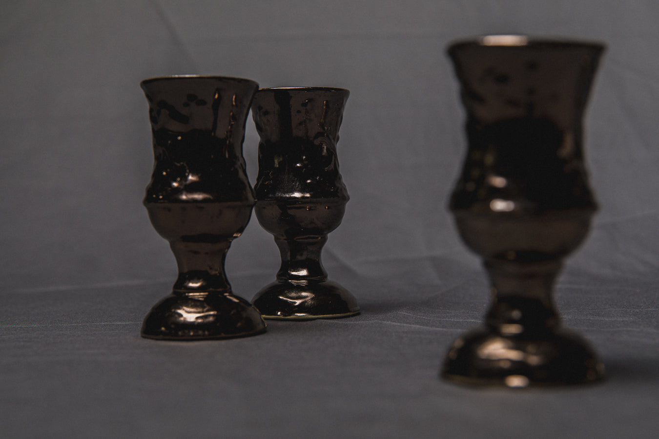 Set of five religious-themed faience CUPS