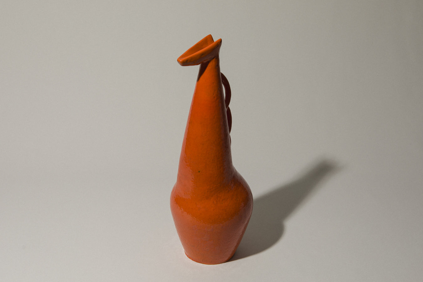Orange giraffe-shaped VASE by István Gádor