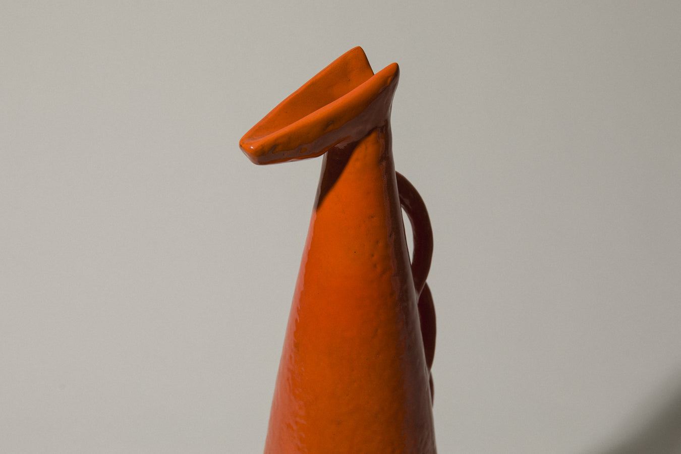 Orange giraffe-shaped VASE by István Gádor