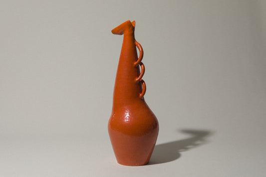 Orange giraffe-shaped VASE by István Gádor